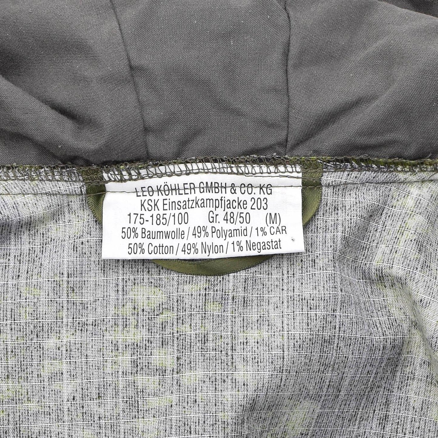 Leo Kohler taktinė striukė su gobtuvu Phantomleaf marginimo etikete viduje, audinio sudėtis ir dydis.