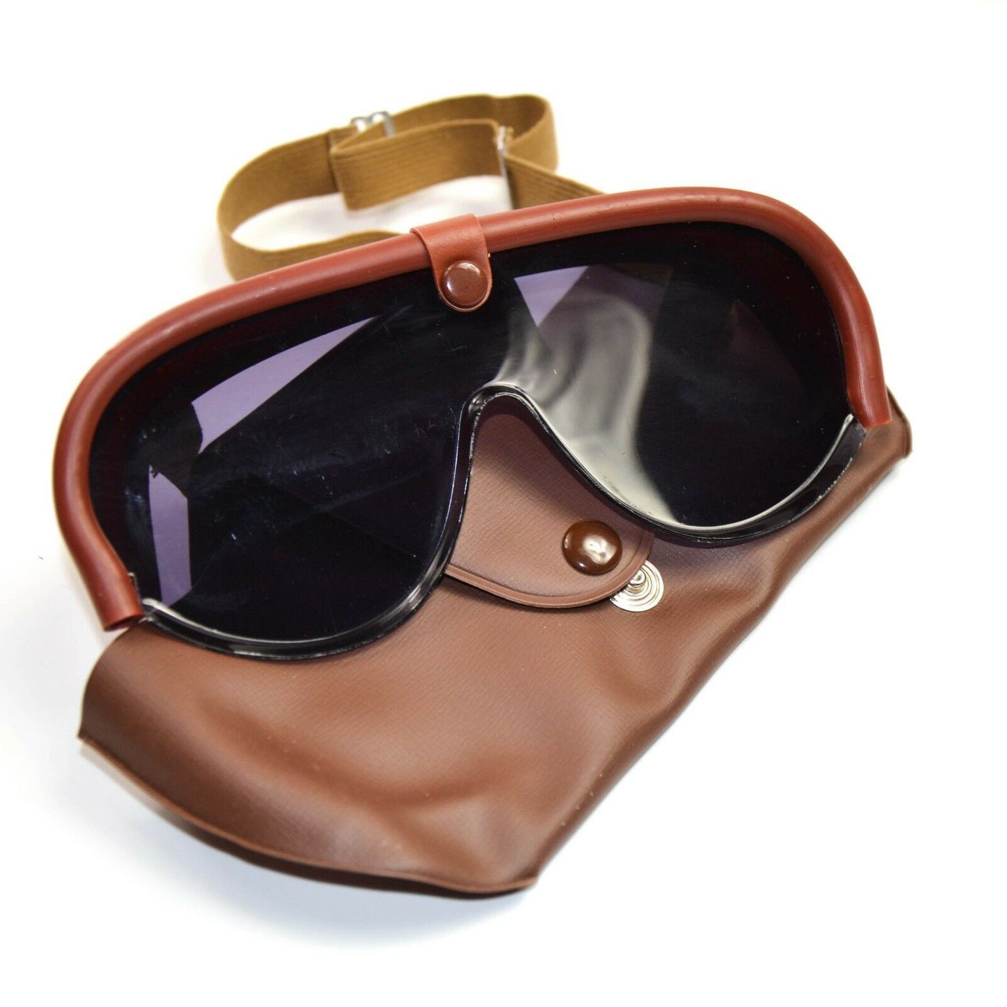 Italijos kariuomenės tankisto apsauginiai akiniai vėjo ir dulkių apsauga su ruda dėkle.