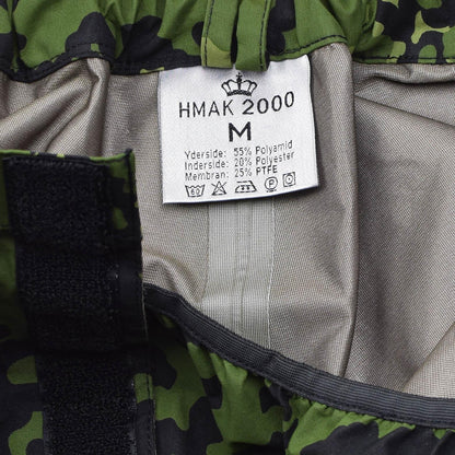 Danijos kariuomenės neperšlampamos kelnės M84 marginimas su užklijuotomis siūlėmis ir poliamido sudėtimi.