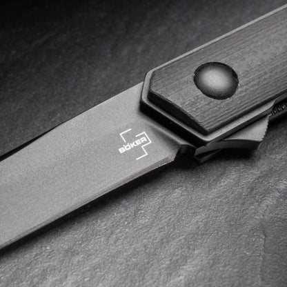 Boker Plus Kwaiken Air Mini sulankstomas peilis su juodu D2 plieno ašmeniu ir G10 rankena.